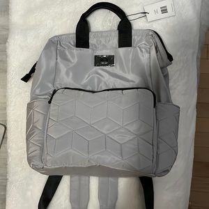 This backpack has a multiple pockets, brand new, never used.